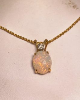 Oval Cabochon Opal and Diamond Pendant